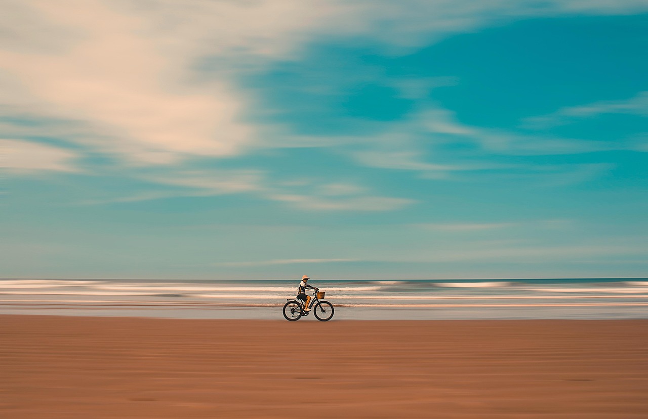 bike beach sea sand sports nature 7742039